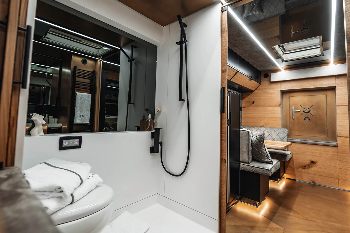 SOD splits the bathroom into a long shower/toilet compartment combo and a separate sink area