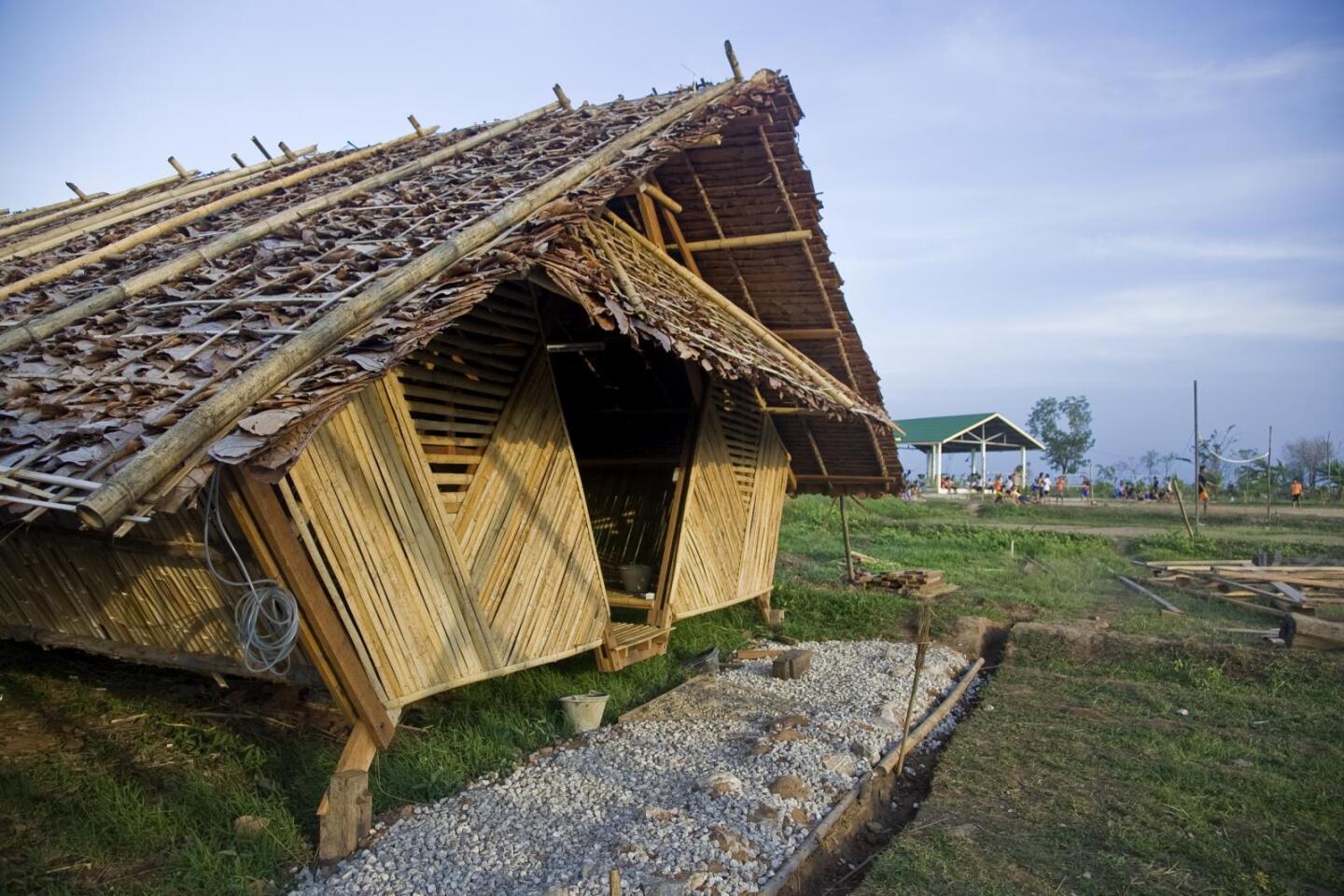 The dorms were designed for rapid construction using local materials and techniques in order to house child refugees from bordering Burma (Photo: Line Ramstad/Allyse Pulliam)