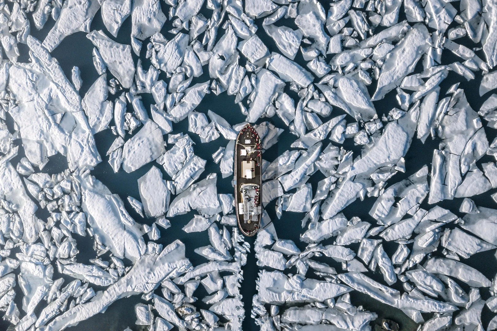 Finalist in The Great Outdoors category of the 2018 EyeEm Awards: A vessel navigates the ice in Hauganes, Iceland