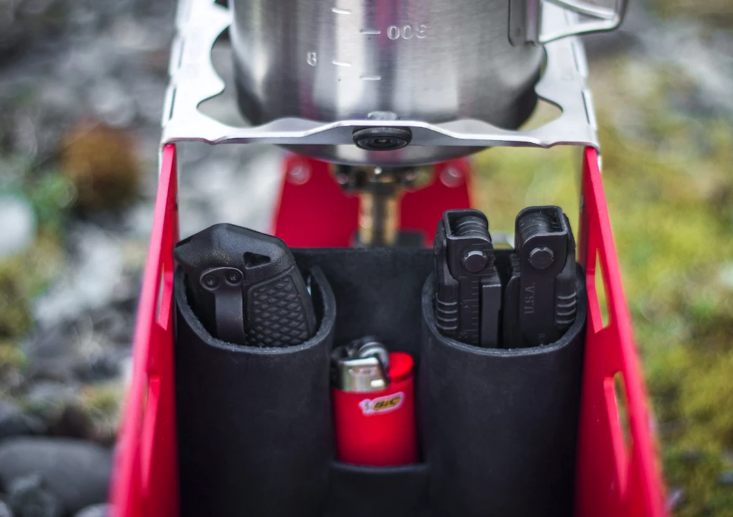 The Trayvax Ration's internal leather organizer secures smaller gear like utensils and lighters