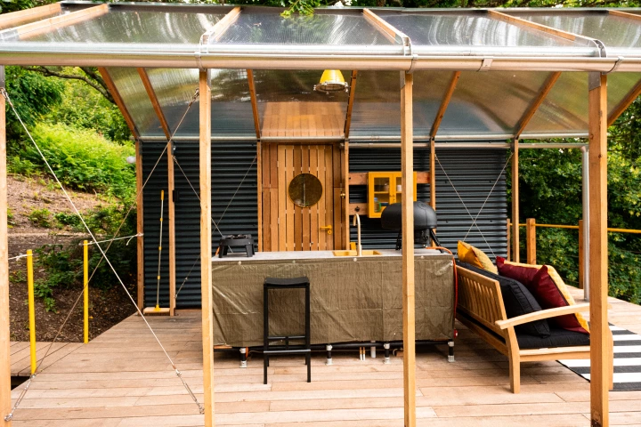 The Birdhouse Modular is a modular tiny house that can be configured as a simple cabin or a much larger family residence