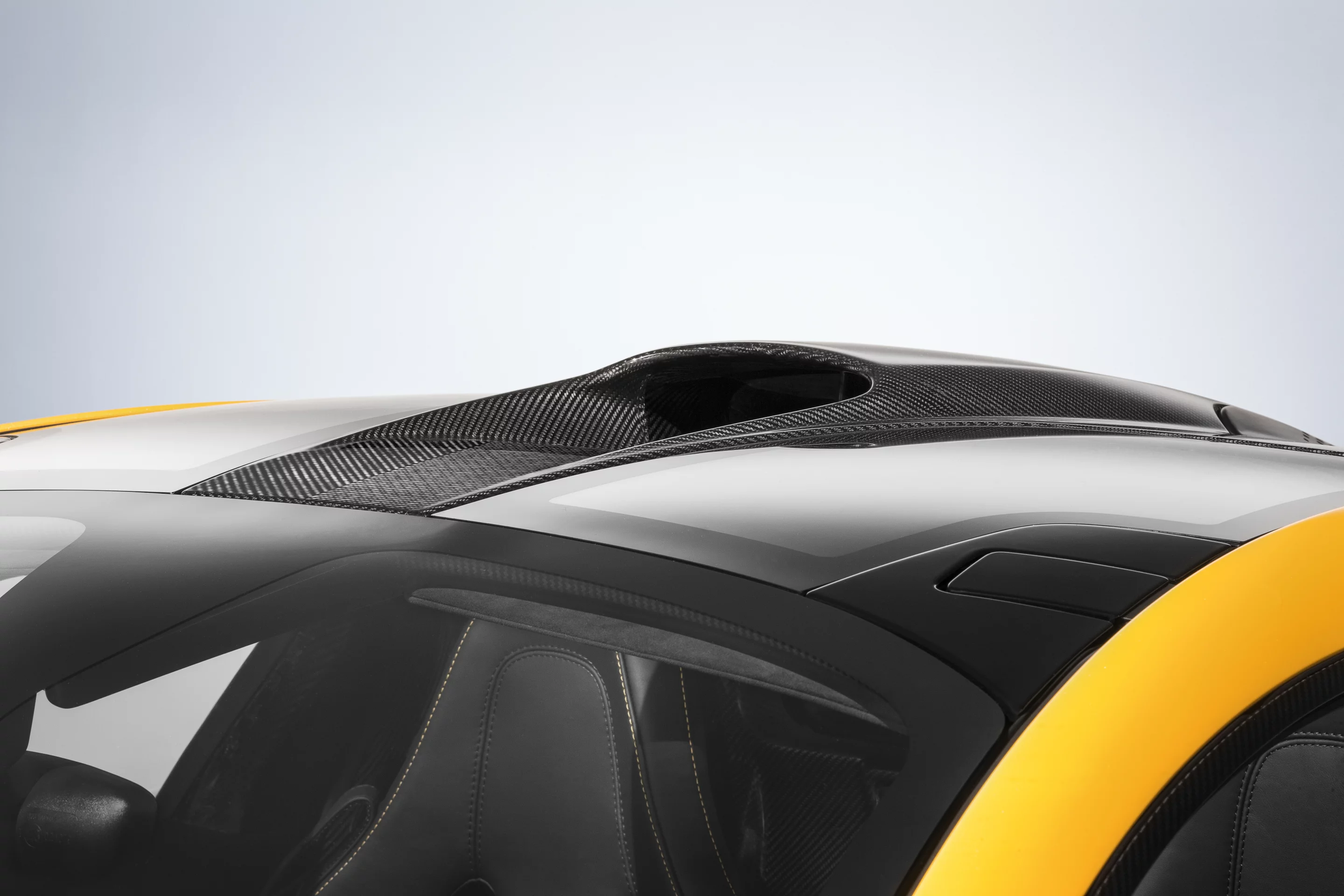 A nod to the F1 is a carbon fiber roof inlet duct that provides additional air to the engine bay