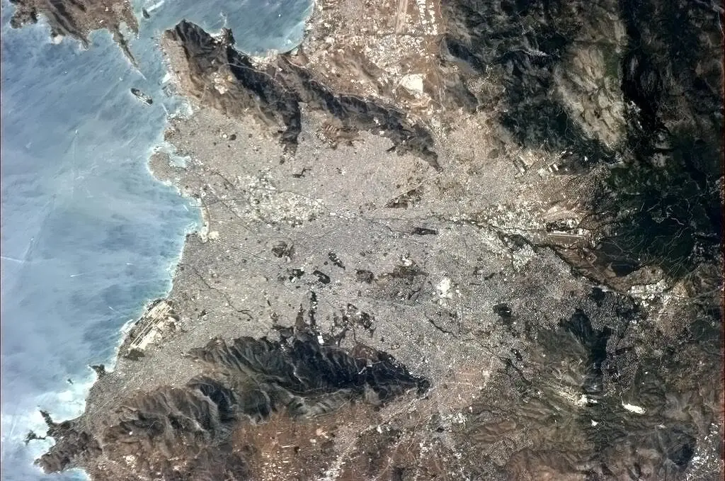 Hadfield: "Athens, Greece, with the reflecting sun showing the wind on the water" (Photo: Chris Hadfield/NASA)