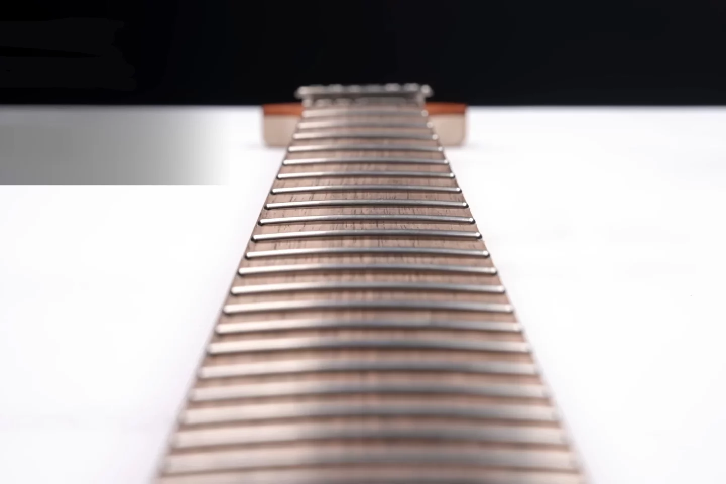 Shark Instruments' guitar necks feature adjustable frets whose height you can tweak using just a hex key