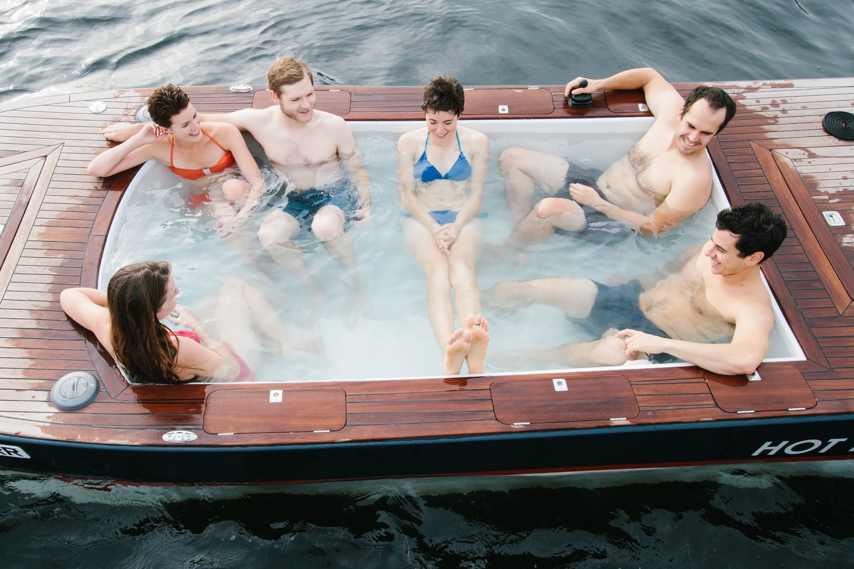The Hot Tub Boat allows its passengers to soak while they cruise