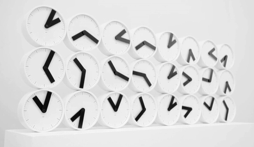 How the Clock Clock looks as its bank of analog clocks is transitioning from one minute to the next