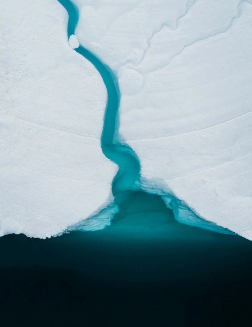 Sermeq Kujalleq is one of the few glaciers through which the Greenland ice cap reaches the sea