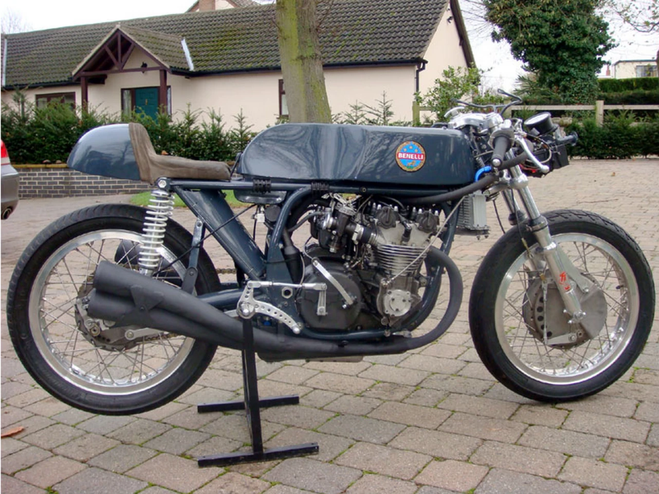 Try as we might, we can't find out much about this 1967 Benelli GP 500 Replica or it's origins, though it is claimed to be "as raced Renzo Pasolini." Pasolini died in the same accident which claimed the life of Jarno Saarinen at Monza on 20 May 1973, so we're not sure if it the bike that Pasolini raced for Benelli or like the bike that Pasolini raced. The images indicate the bike is at very least a perfect replica of the real deal, and the only precedent we can find is a Benelli 350cc Beale Replica which sold for GBP£55,400 ($104,343) at Bonhams Autumn Stafford Sale in October, 2006. Watch the bidding on this one, as there is every chance of asymmetrical knowledge in the audience.