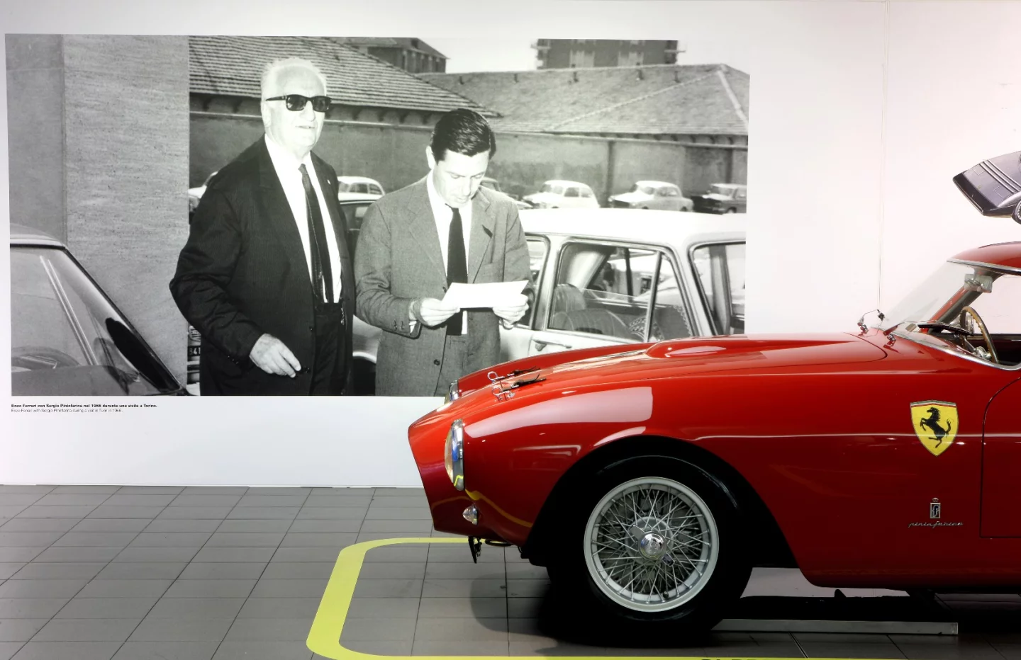 Enzo Ferrari and Sergio Pininfarina pictured together on the wall of the Ferrari museum in Maranello.
