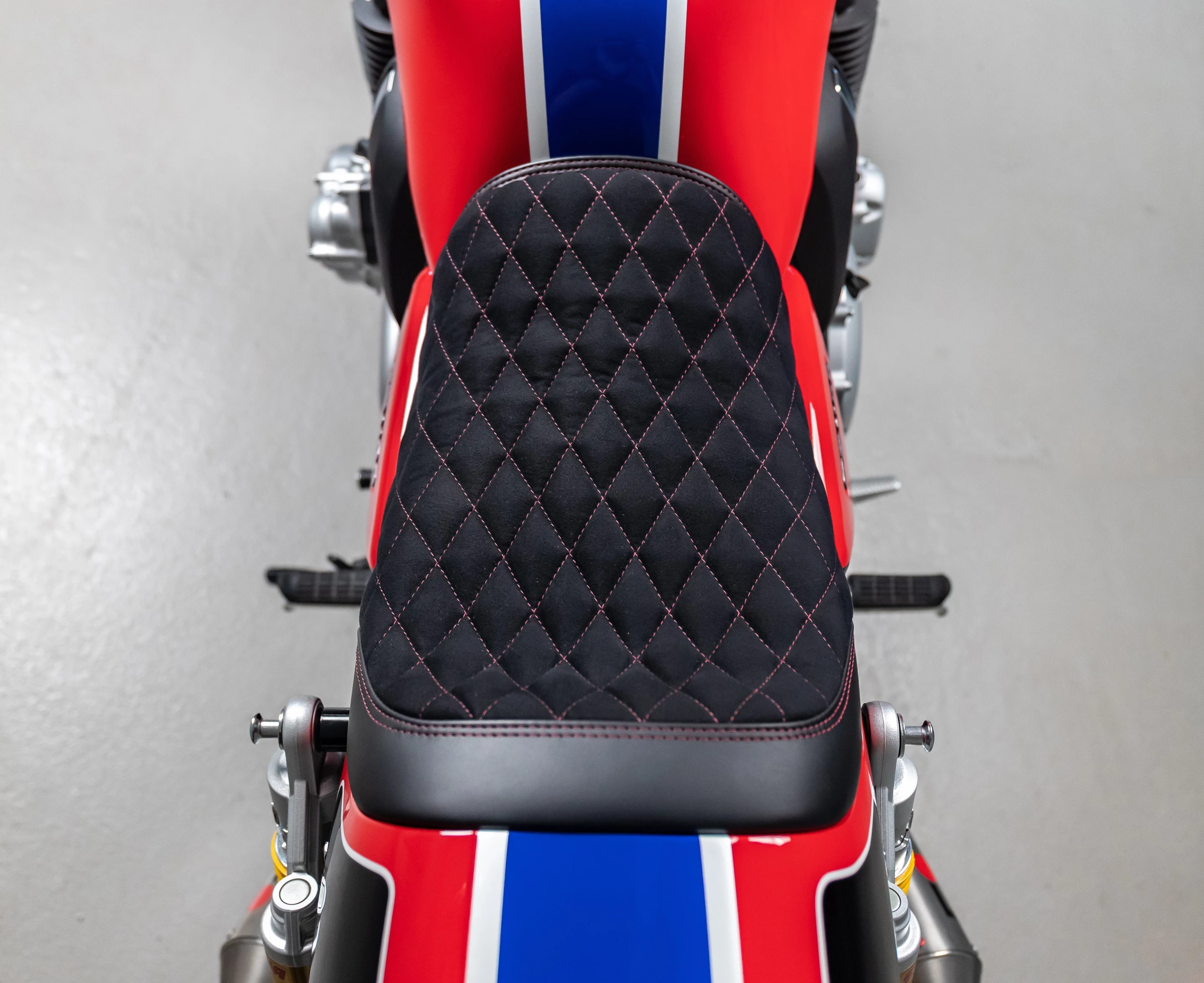 Diamond-stitched seat is covered in Alcantara