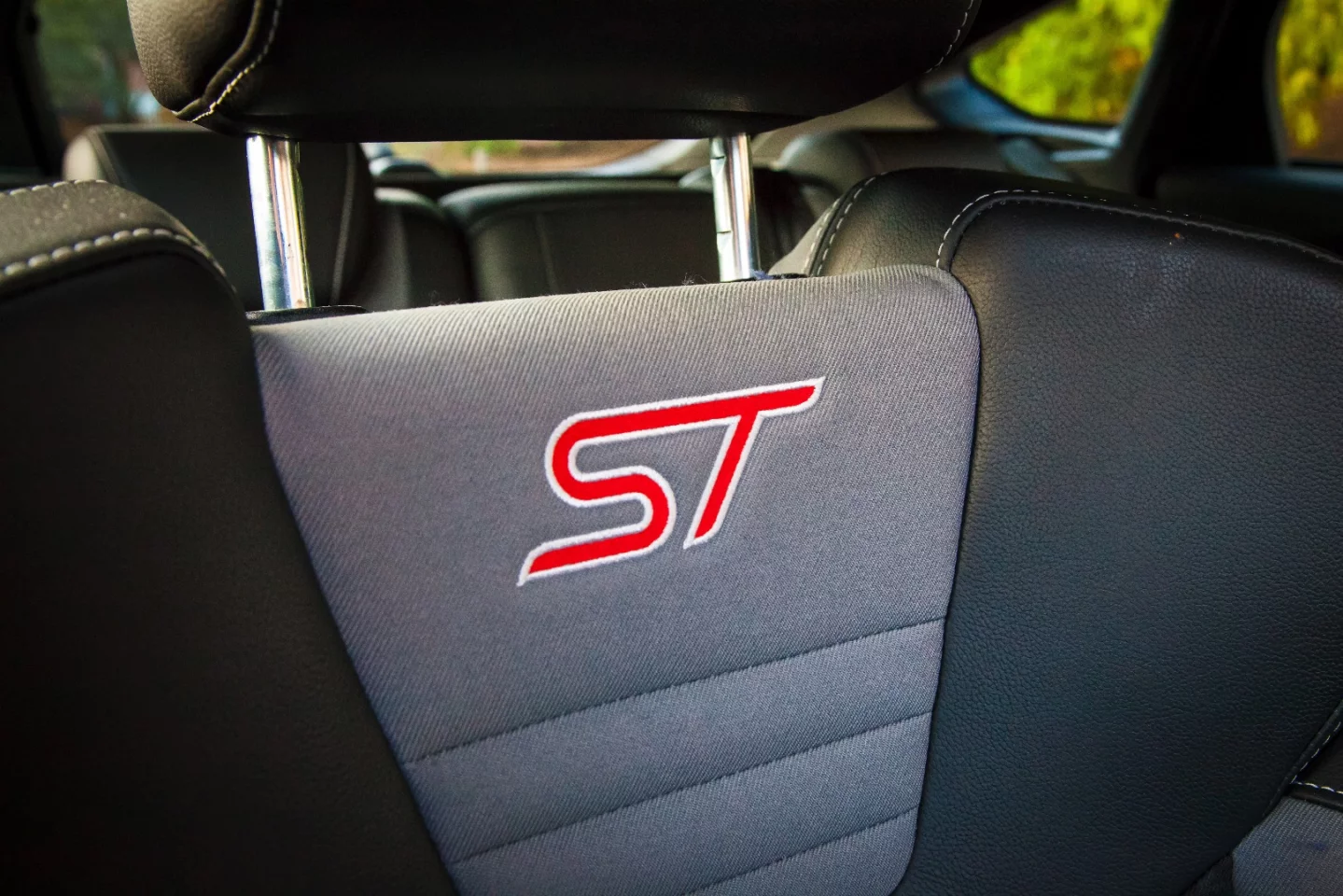 The interior is finished to a higher standard than the Renault Megane we drove last year, but there's still lots of racy touches around the cabin