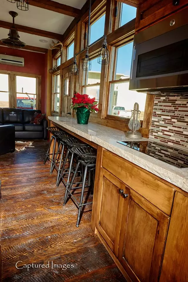 The breakfast bar style dining area seats four