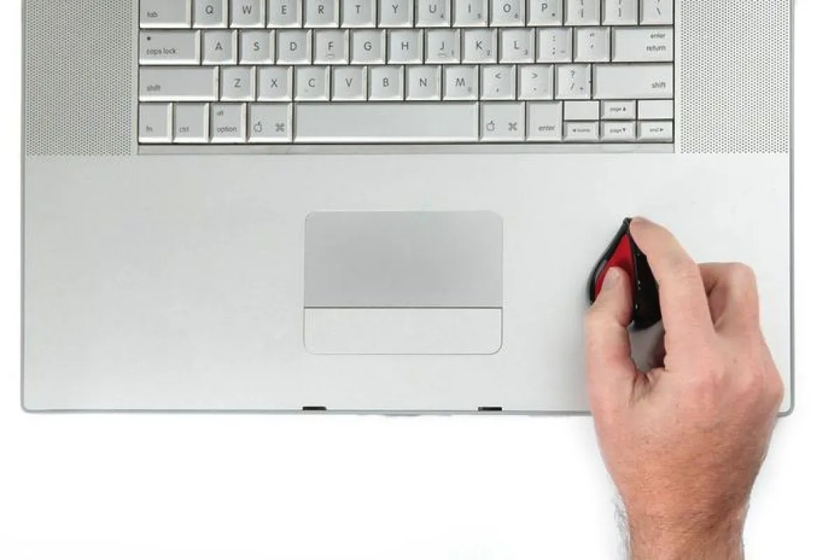 The Swiftmouse offers pen-like comfort and traditional mouse functionality while sitting on top of a laptop's palm rest