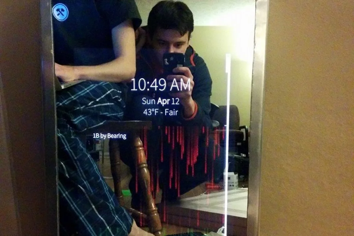 MirrorMirror displays digital info, along with the user's reflection (Photo: Purdue University)