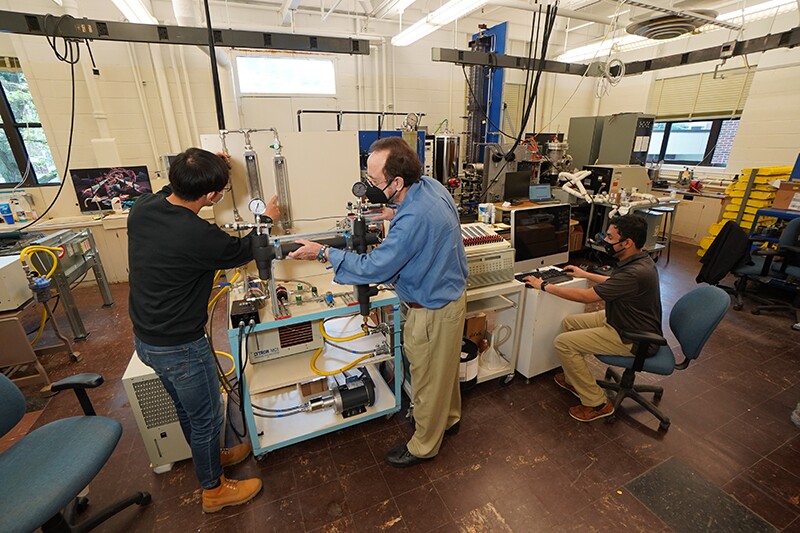Leader of the research Issam Mudawar (center) in the lab at Purdue University