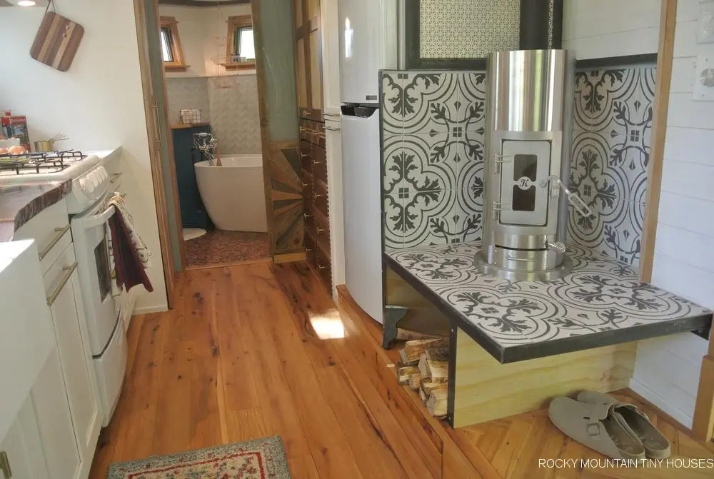 The San Juan Tiny House is warmed by a small wood-burning stove