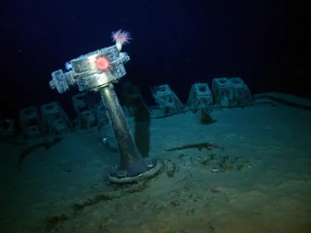 The emergency stern settering pedestal of the SS Gairsoppa shines in the lights of Odyssey's Remotely Operated Vehicle (ROV) during a visual inspection of the site approximately 4,700 meters deep