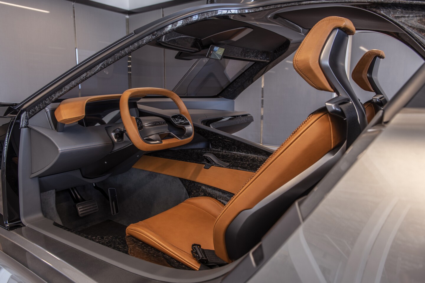 At the wheel of the Karma SC1 concept