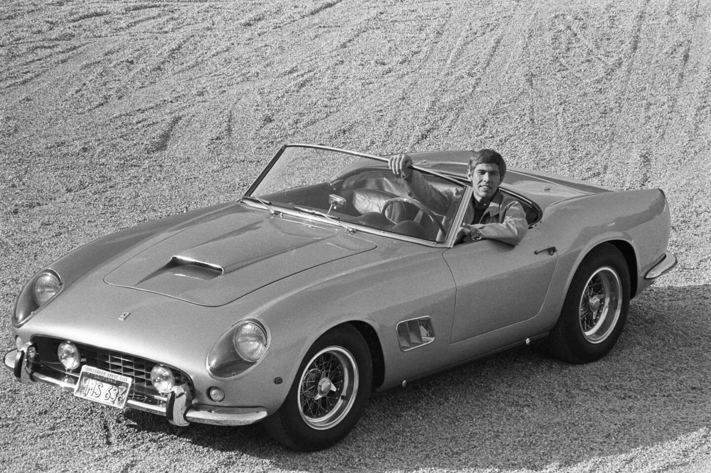 James Coburn in the auction car. Coburn introduced his friend Steve McQueen to the joys of Ferrari automobiles.Image: RM Auctions