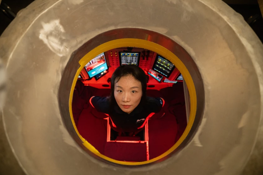 Assistant Professor Mengran Du inside China's deep-sea manned submersible Fendouzhe, at Sanya Institute of Deep-sea Science and Engineering