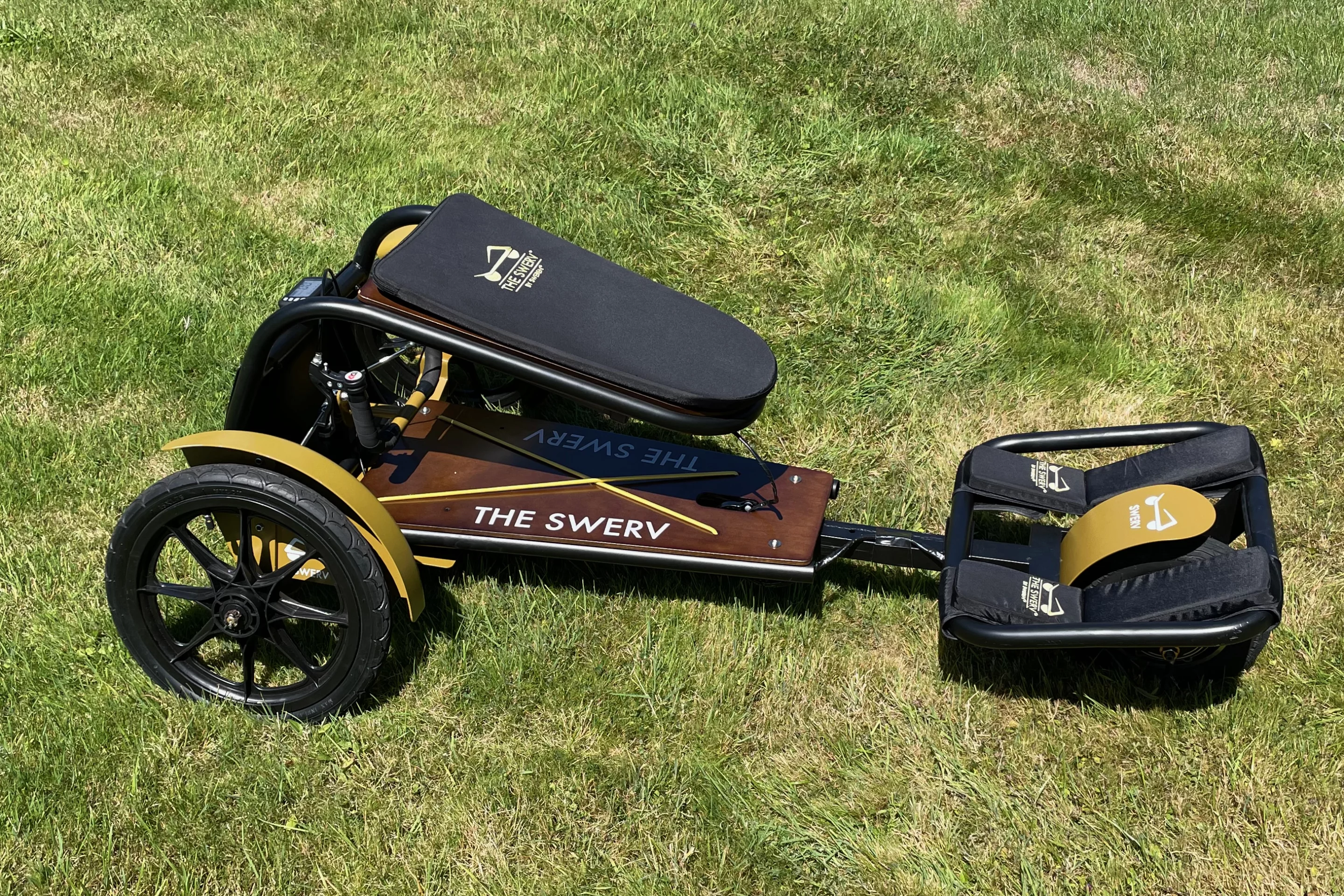 The Kids model features a powder-coated stainless steel adjustable-length frame