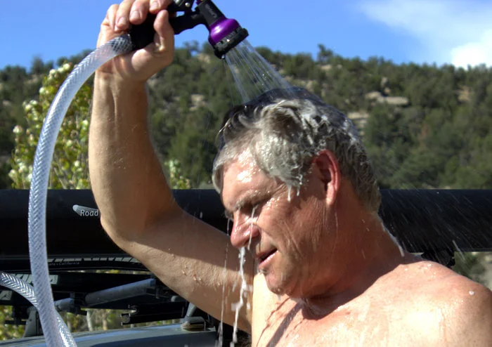 The Road Shower reportedly produces higher pressure than a traditional solar bag shower