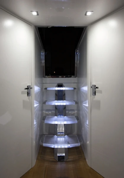 Illuminated steps connect upper and lower decks