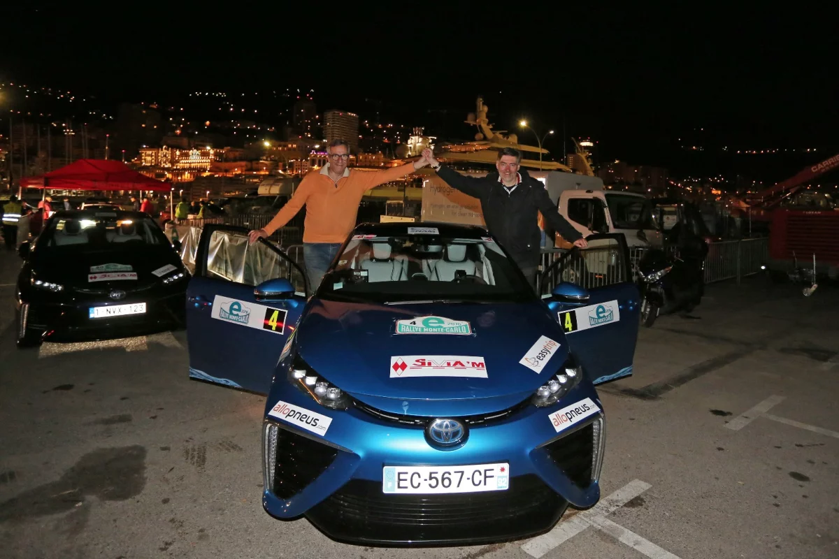 Winning driver Artur Prusak (left) and co-driver Thierry Benchetrit (right) celebrate their victory in the inaugural E-Rally Monte Carlo