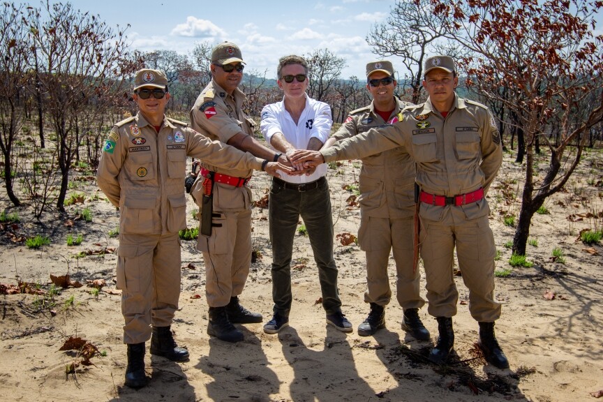 Extreme E founder and CEO Alejandro Agag (center) poses with