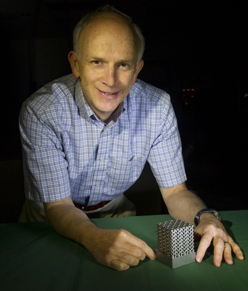 NASA technologist Tim Stephenson with a structure made of Invar (Photo: NASA Goddard/Bill Hrybyk)