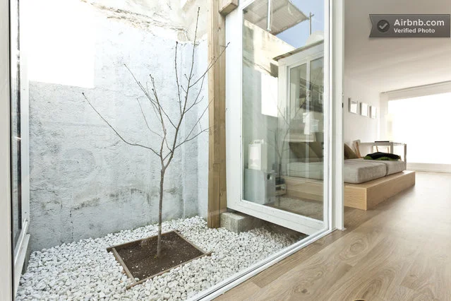 The home features an internal private Japanese garden which doubles as a light shaft, allowing natural light to filter through the central part of the home