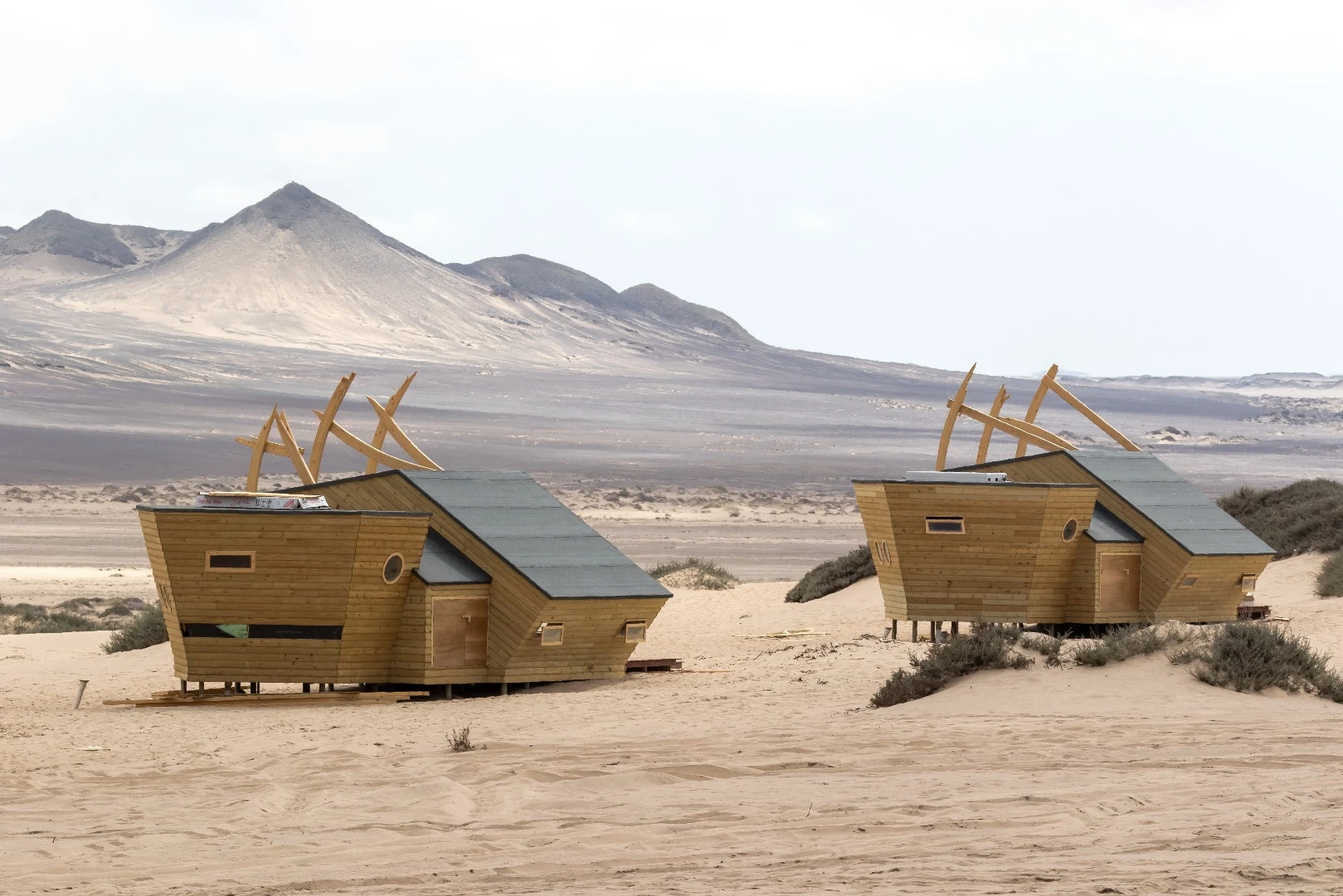 Inside the cabins at Namibia's Shipwreck Lodge, guests find a wood burner stove and an ensuite