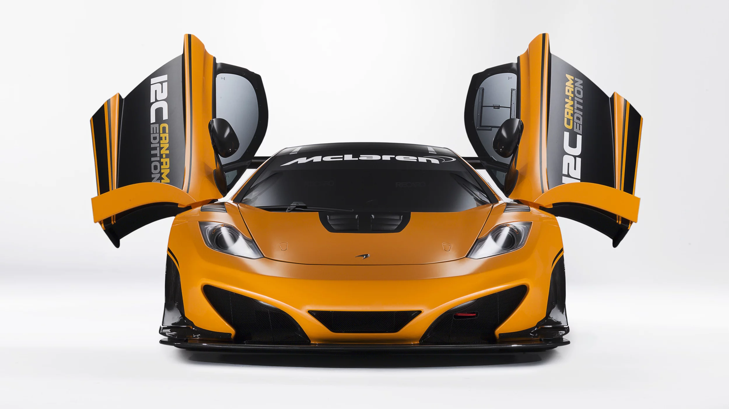 McLaren 12C Can-Am Edition racing concept low front view door open