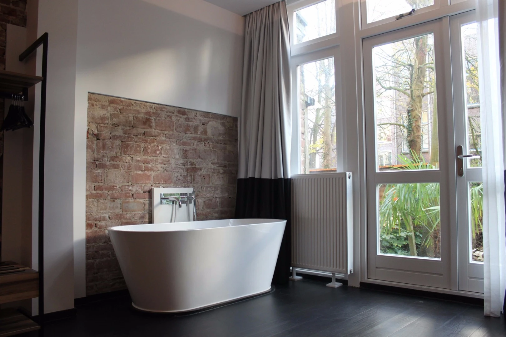 Some of the bathrooms at the Arcade Hotel have tubs in which for guests to relax