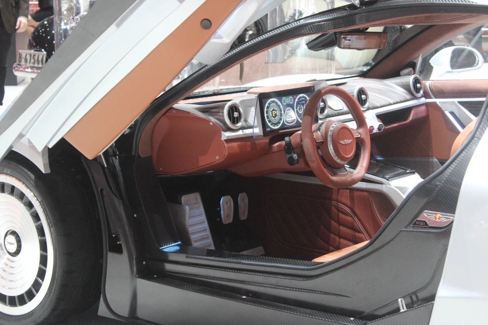 The interior looks highly snazzy, and fits with the luxury grand touring concept of the car, as much as you can expect to grand tour with an electric at this point