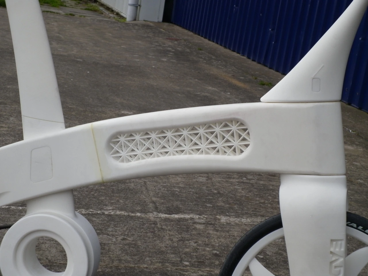 Embossed text features at various points, which were produced as the bike was formed