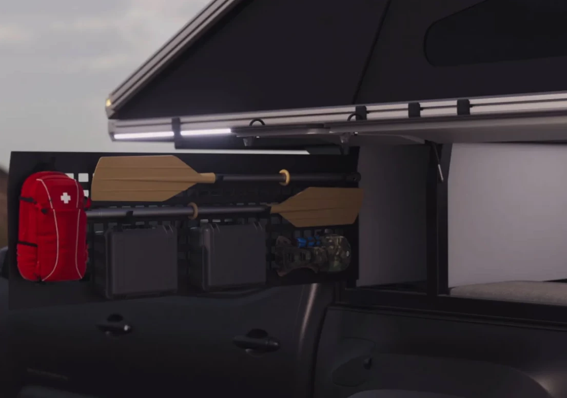 An interesting idea for a pull-out MOLLE storage panel in the available front pass-through locker