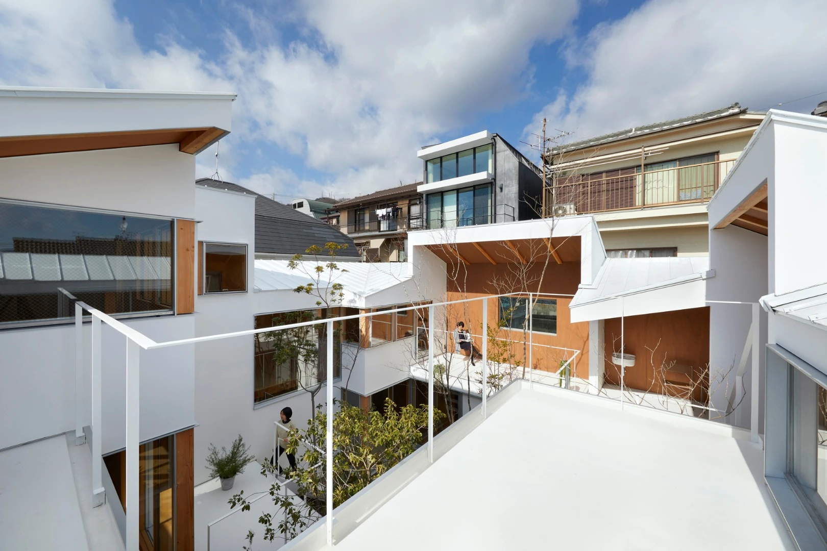 The two-story Loop House features a courtyard at its heart