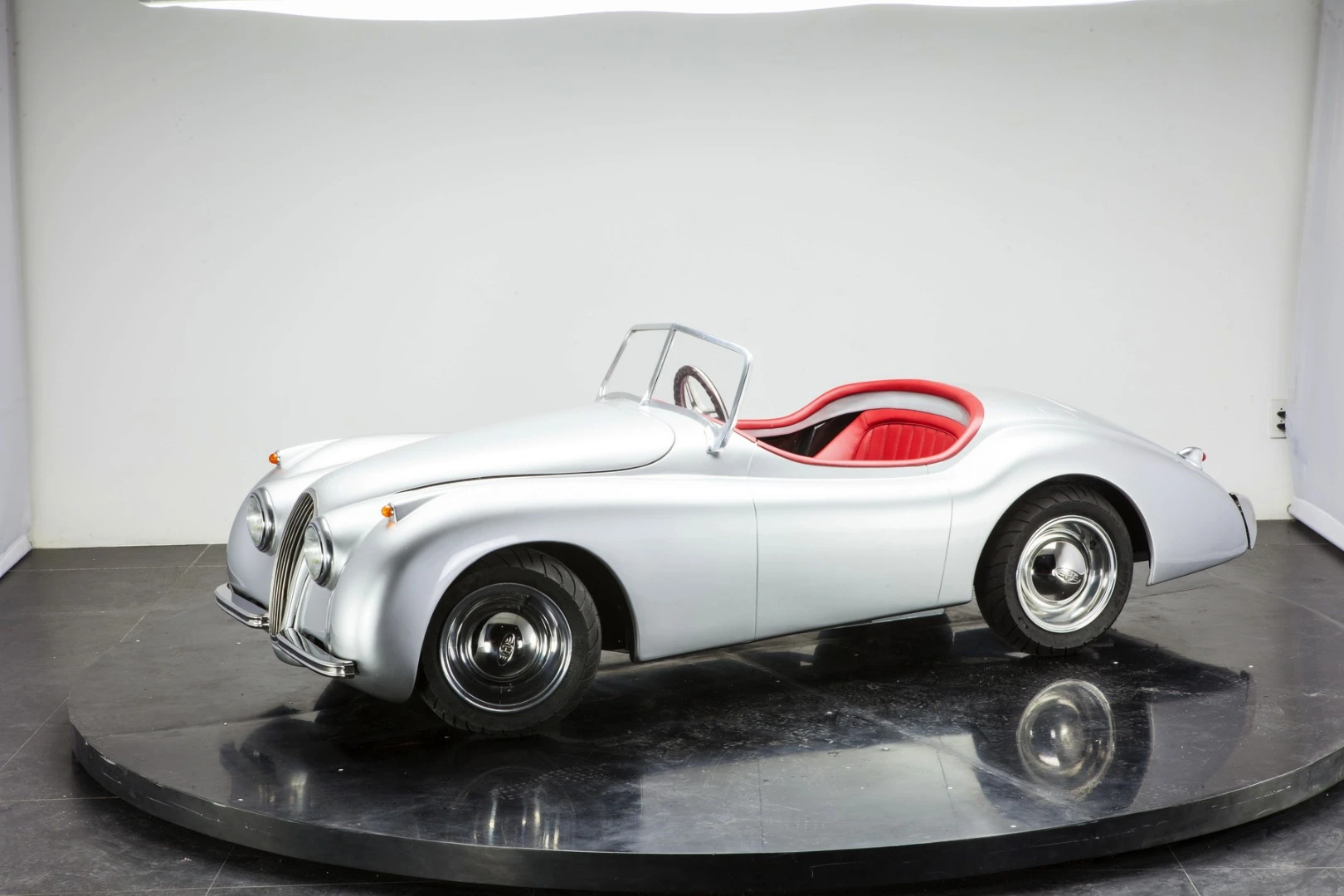 The ex-factory retail prices for the XK120 is £7,999, US$12,399 or €11,299 depending on the customer 's preferred currency, with shipping costs on top of that