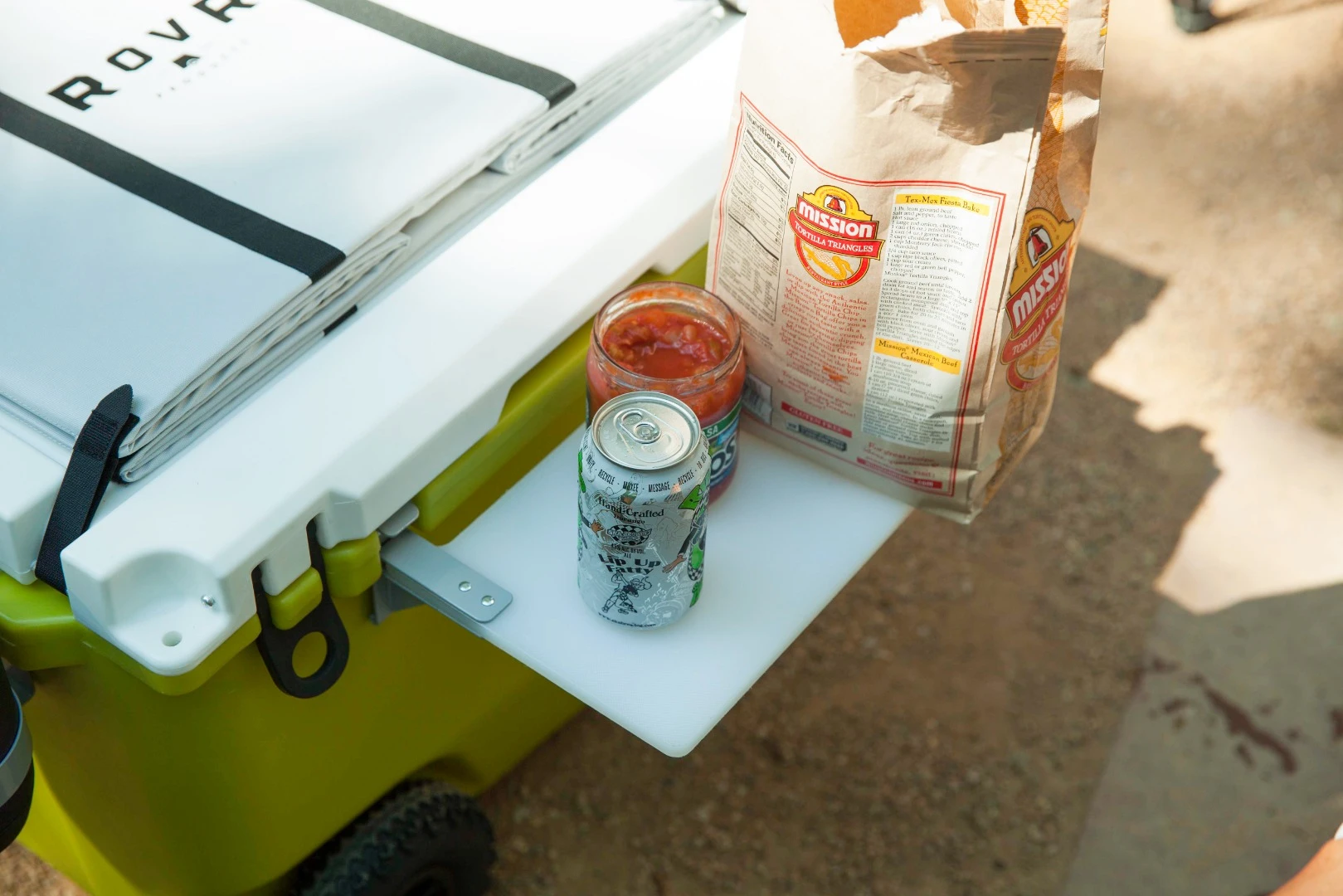 We think a side table would be a better use for the Rovr Rollr cutting board, while the collapsible storage bin on top sounded like a good idea, but it always felt like by the time we secured it to the cooler top and filled it with gear, we could have just brought the gear separately