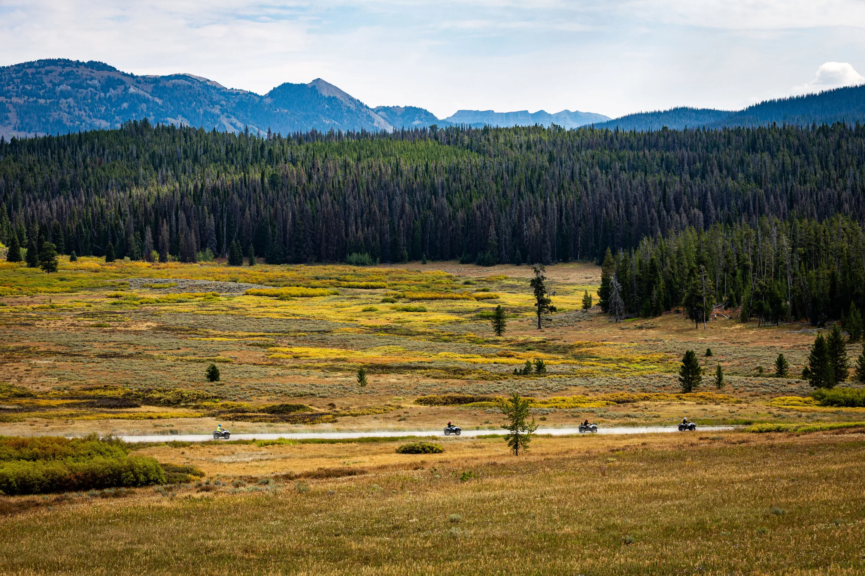 The beauty of the Jackson Hole, Wyoming area was unbothered by the silent line of electric ATVs along the road