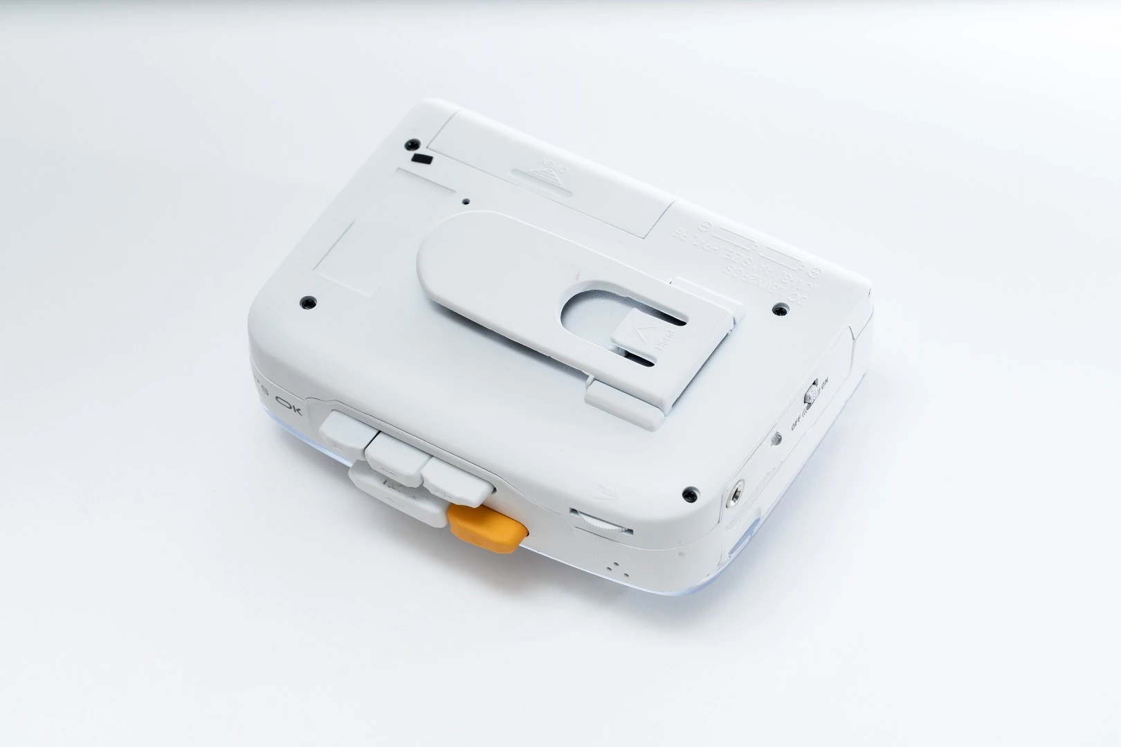 There's a clip on the back of the It's OK unit so you can hang it from your belt or bag strap