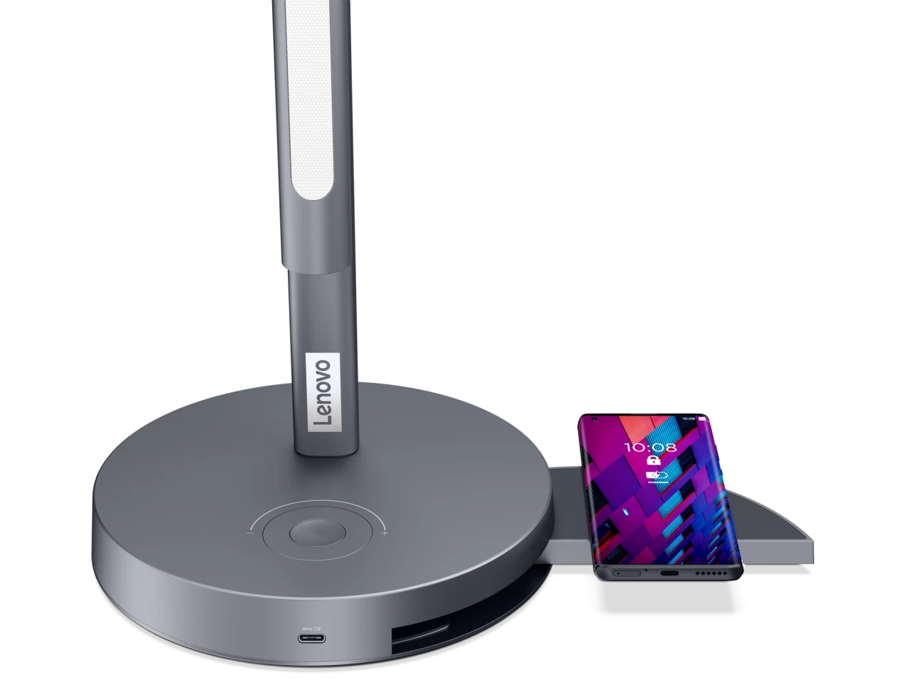 In addition to a multi-port hub, the base also hosts a wireless charging pad
