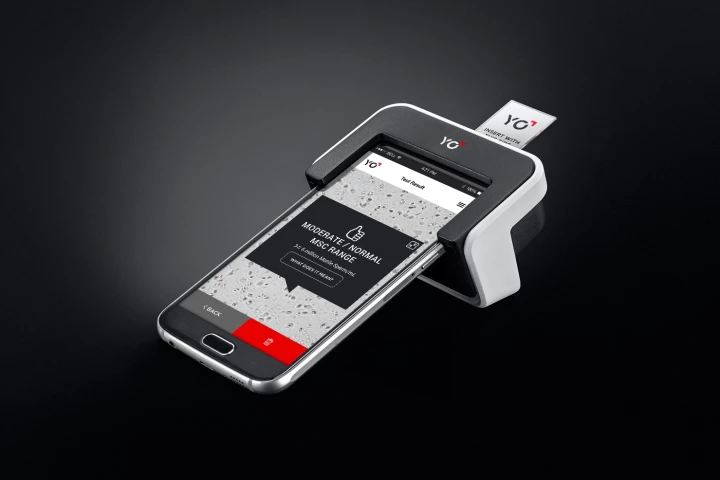 The Yo Clip (on phone), with a semen sample inserted on a slide