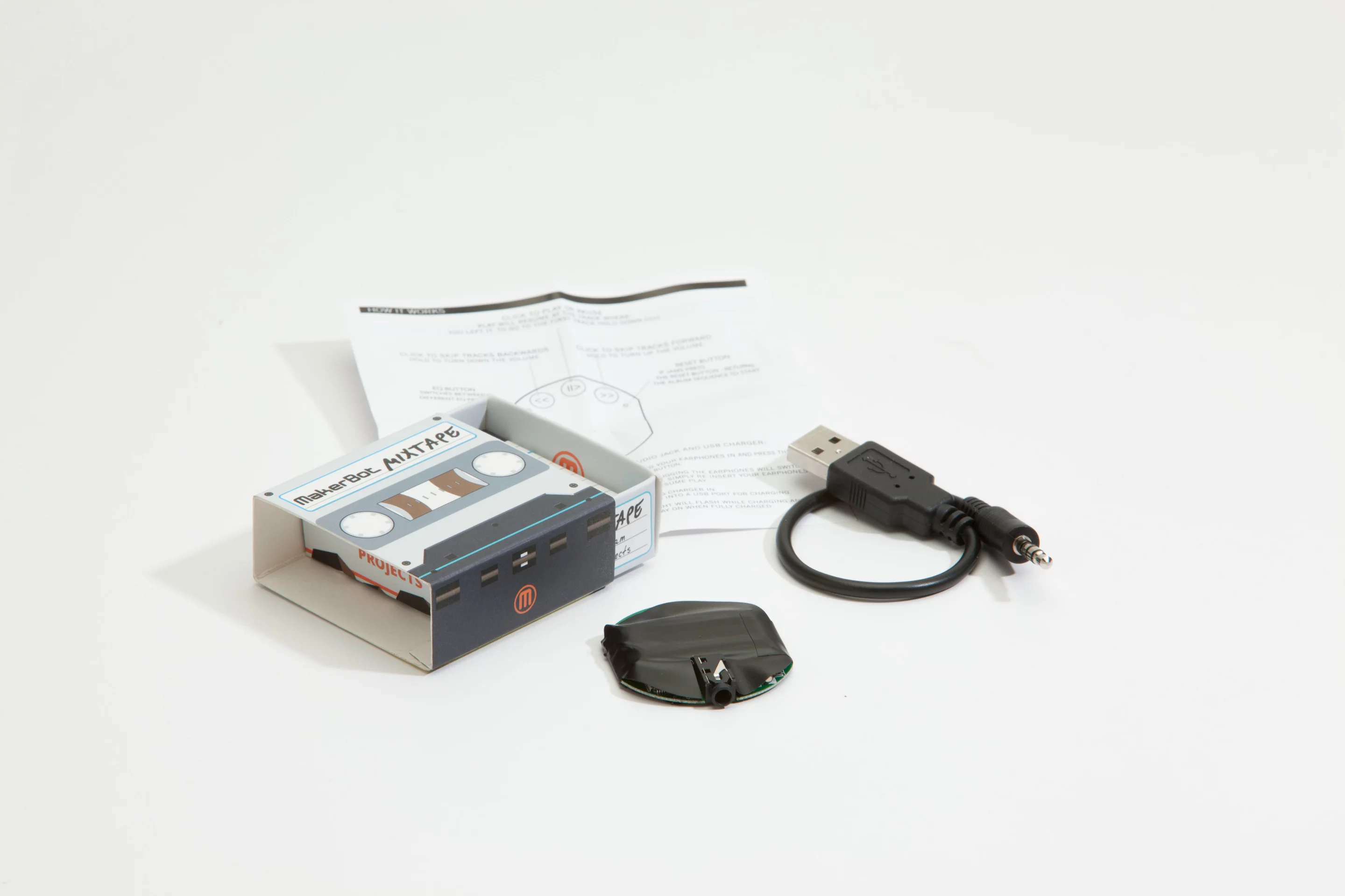 The Mixtape kit - featuring instructions, electronics and USB cable. The design files will need to be downloaded and fed into a 3D printer