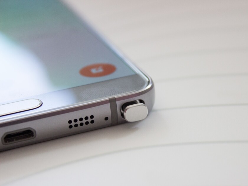 After clicking the top of the pen, it juts out a bit – making it easier to unsheathe