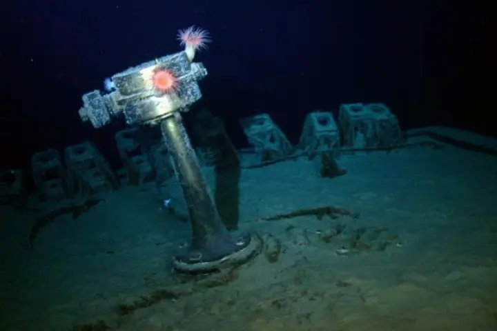 The emergency stern settering pedestal of the SS Gairsoppa shines in the lights of Odyssey's Remotely Operated Vehicle (ROV) during a visual inspection of the site approximately 4,700 meters deep
