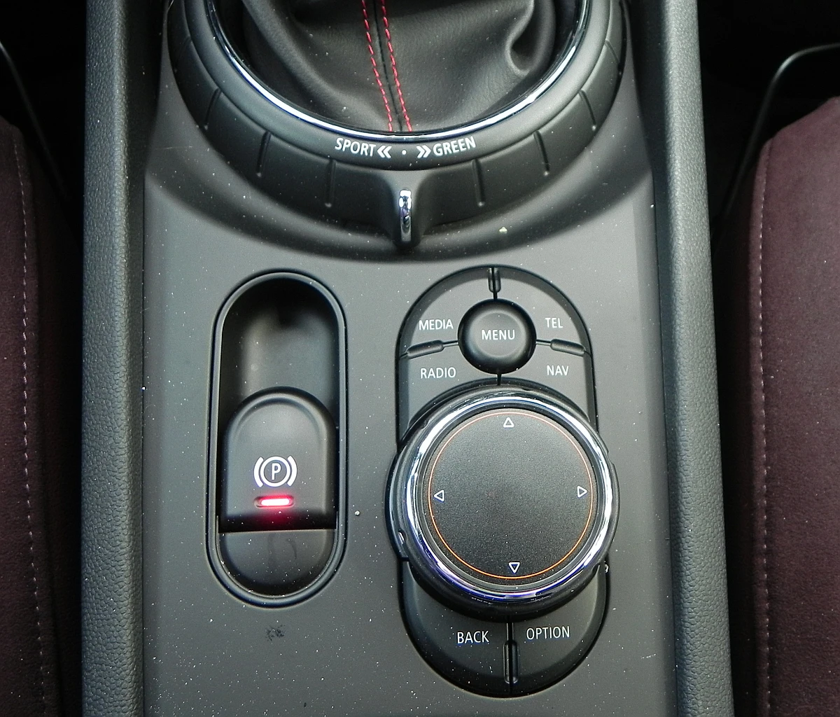 Like other BMW vehicles, the Mini’s dial-based controller has a touchpad on top and is located just forward of the center armrest for easy access