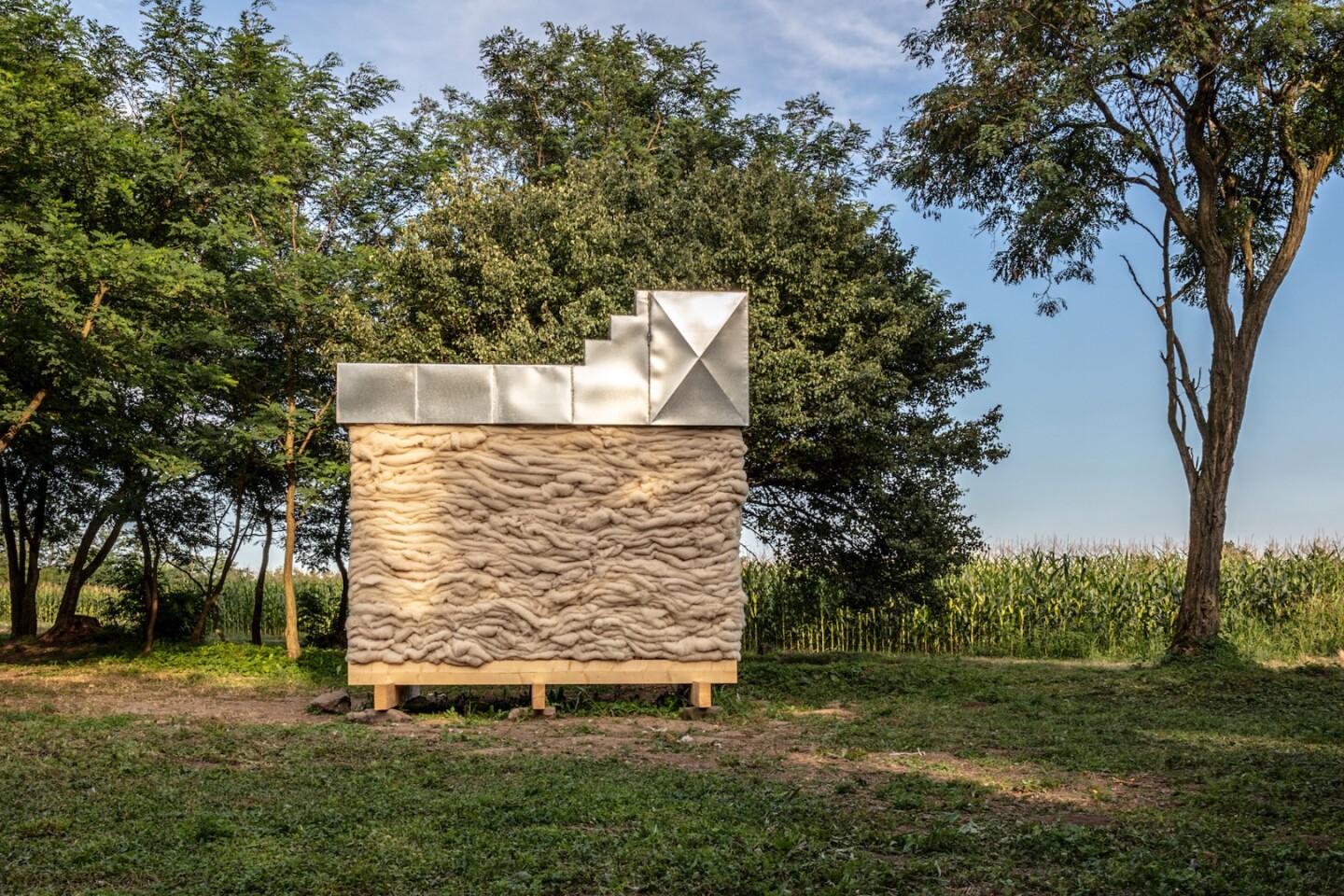 Hello Wool is both clad and insulated with wool, and is envisioned as a quiet retreat for use by just one person