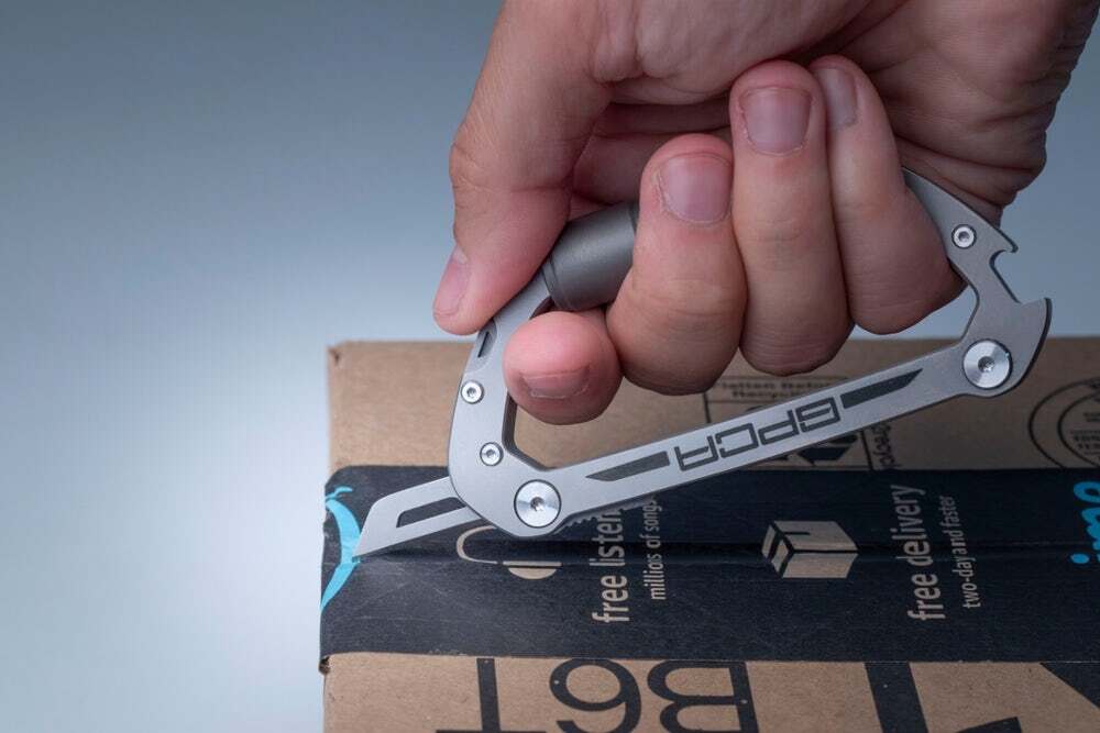 The carabiner has a box cutter